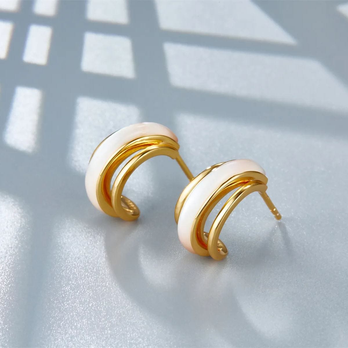 Pendientes Curves en oro vermeil de 18 quilates